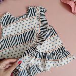 ست تاپ نخی و شلوار برمودا دخترانه گلدار سفید